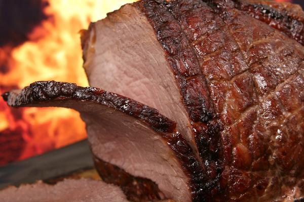 Roast of beef being sliced.