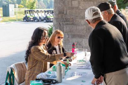 Registration table at 2022 HDD Charity Golf Tournament.