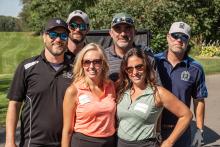 Golfers at the 2023 Hickory Dickory Decks charity golf tournament.