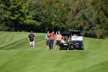 Golfers at the 2023 Hickory Dickory Decks charity golf tournament.