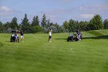 Golfers at the 2023 Hickory Dickory Decks charity golf tournament.