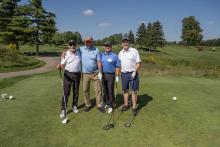 Golfers at the 2023 Hickory Dickory Decks charity golf tournament.